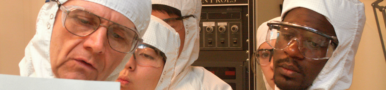 CNF staff member instructs users in the cleanroom during the TCN