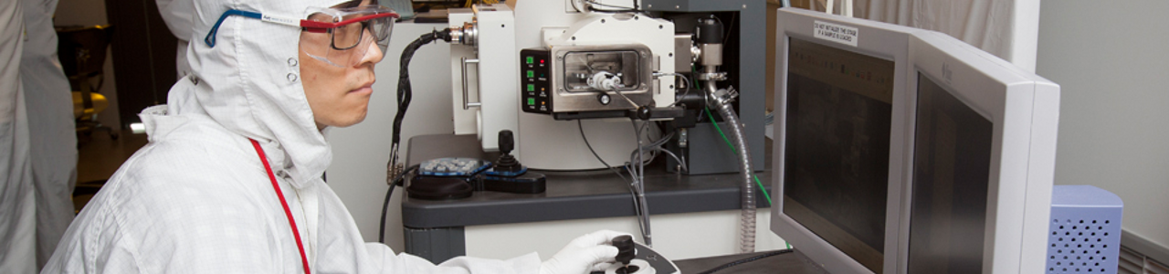 A researcher works in the CNF Cleanroom