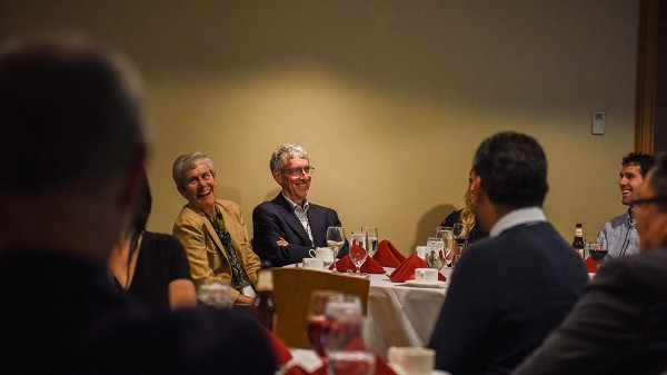 Harold Craighead sits next to his wife, Teresa, as former students share stories during a symposium honoring his career June 1 in the Physical Sciences Building