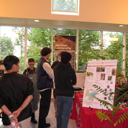 Visitors at the CNF Spotted Lantern Fly exhibit