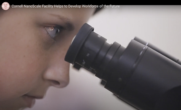 Close up of ATLAS student at work in CNF cleanroom