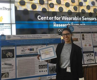 Rachel Miller displays a Best Poster Presentation certificate that she earned while making a poster presentation while an undergraduate student at UC San Diego. Credit: Rachel Miller