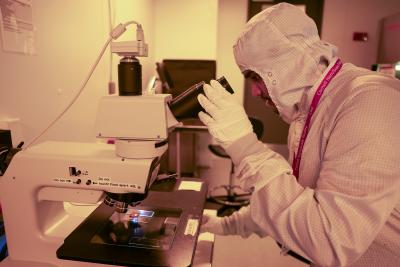 Nandan Reddy Muthangi examines the microscopic architecture and surface quality of a test chip he is developing in partnership with the company Xallent. Photo credit: Charissa King-O'Brien
